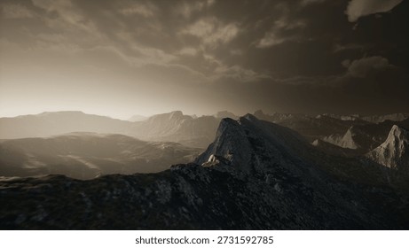 Dramatic mountain peaks stretch across the horizon as dusk settles in. A soft glow highlights the rocky landscape, creating a tranquil atmosphere of natural splendor.