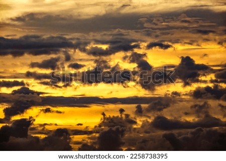 Dramatic sunset cloudscape late in spring, southwest Florida. Light digital oil-painting effect, 3D rendering.