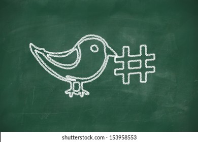 Drawing of a bird holding a twitter hashtag for social media tag 