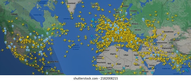 Dresden, Germany - July 24, 2022: Map Of Europe, North America, Middle East, And India Over Charted Flights. Concept Of Global Travel And Business Activity In Summer