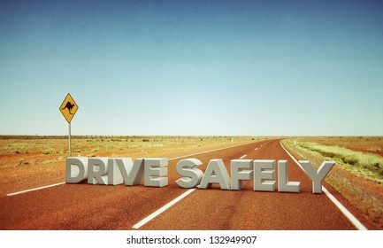 Drive Safely Sign In A Desert Road