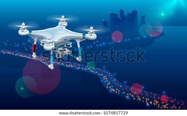 Drone with video camera In The\
Air Over City Roadway. Unmanned Aircraft System or UAV monitoring\
street traffic or photography urban landscape in the Night\
.
