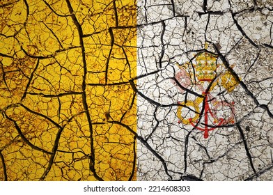 Dry Soil Pattern On The Flag Of Vatican City. Country With Drought Concept. Water Problem. Dry Cracked Earth Country.	