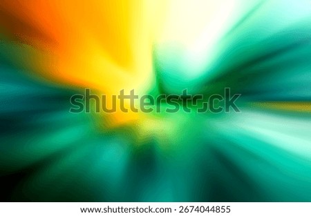 Dynamic abstract background with radial motion blur in vibrant orange, yellow, and green hues, suggesting speed or energy.