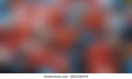 A dynamic abstract composition featuring swirling patterns of red, orange, and blue hues, creating a sense of movement and energy.