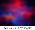 Dynamic abstract image featuring blurred swirls of deep red and blue hues blending into a dark backdrop, evoking energy and motion.
