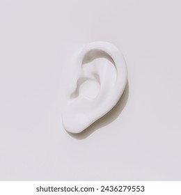 Ear white sculpture isolated. Human ear organ hearing health care concept 3d rendering