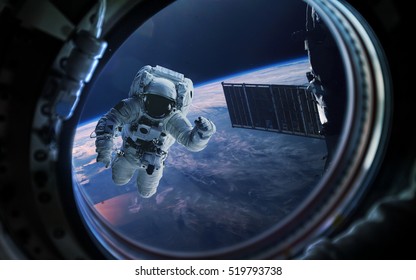 Earth Planet And Astronaut In Space Ship Window Porthole. Elements Of This Image Furnished By NASA