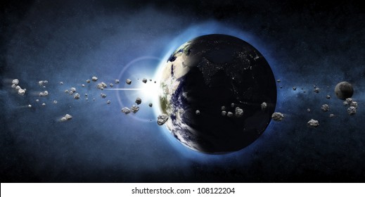 Earth Planet With Rising Sun And Asteroid Belt (Elements Of This Image Furnished By NASA)