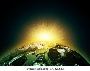 Earth planet in sun rays. Elements of this image are furnished by NASA