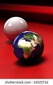 Earth (showing Europe and Africa) in the form of a pool ball on a red pool table - shallow depth of field