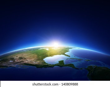 Earth sunrise over cloudless North America (Elements of this image furnished by NASA)