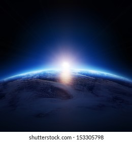 Earth sunrise over cloudy ocean with no stars -  Elements of this image furnished by NASA 
