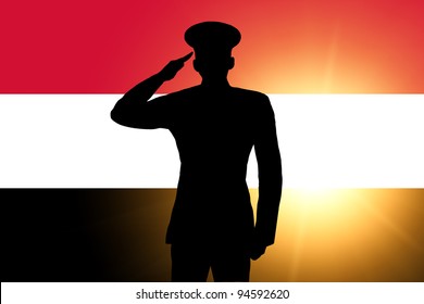 The Egyptian Flag And The Silhouette Of A Soldier's Military Salute