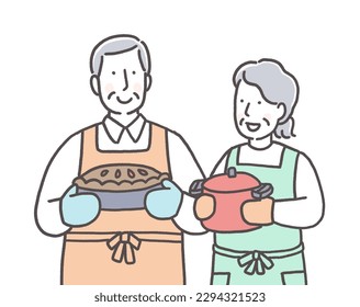 Elderly man and woman enjoying cooking and baking - Powered by Shutterstock