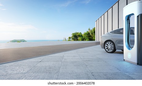Electric car on concrete floor near charging station in eco friendly and clean energy concept. 3d rendering of sea view plaza with clear sky background.