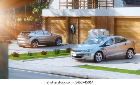 Electric Cars Parked In Front Of Home Modern Low Energy Suburban House 3d Illustration