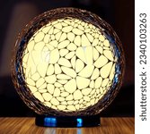 Elegant 3D-generated lamp on a table emitting warm light, featuring an organic design with spherical glass and Voronoi motifs.