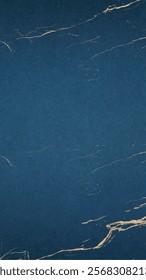 Elegant blue background with a textured blue surface and gold marble veins. The background is stylish and sophisticated. Simple blue mobile wallpaper with copy space.