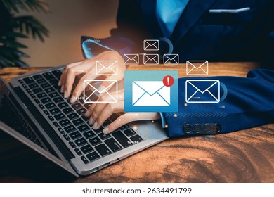 Email concept. Hands Typing on Laptop Keyboard with Email Icons and Notifications in a Modern Workspace Environment.