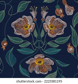 Embroidery seamless pattern with beautiful flowers, leaves and berries on dark background. Fashion design.