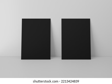 Empty 2 black vertical rectangle A4 paper sheet mockup on floor over grey wall, 3D rendering
