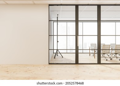 Empty beige wall and the meeting room glass door with a table, office chairs and a flip chart inside. Eco friendly floor design, using wood material. A concept of a hallway interior. 3d rendering - Powered by Shutterstock