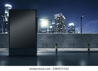 Empty black outdoor billboard screen on night city background. Advertisement and commercial concept. Mock up, 3D Rendering - Powered by Shutterstock