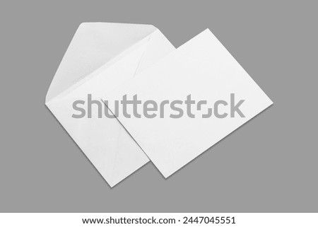 Empty Blank white envelope with card mockup isolated on a grey background.3d rendering. Greeting or invitation card design.
