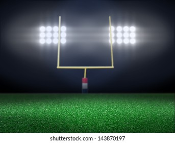 Empty football field with spotlight at night