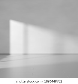 Empty gray minimalistic room interior only with floor wall and sunlight from window. 3D rendering.