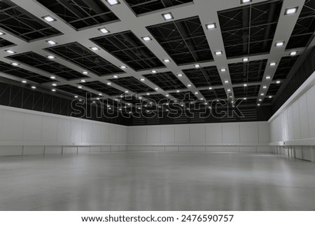 Empty hall exhibition centre.The backdrop for exhibition stands, booth,market,trade show.Conversation for activity,meeting.Arena for entertainment,event,sports.Indoor  for Factory,showroom.3d render.