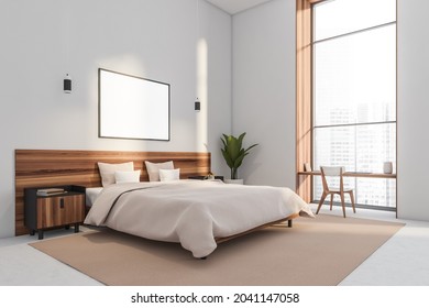 Empty Horizontal Canvas On The White Wall Of The Bedroom Interior With A Desk In A Window Niche And A Big Wood Bed Headboard. Concrete Floor. A Concept Of Modern Hotel Design. Mockup. 3d Rendering