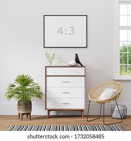 Empty horizontal frame 4:3 on white wall in scandinavian interior with wood floor, white dresser, armchair, decor and green plants. 3d rendering.