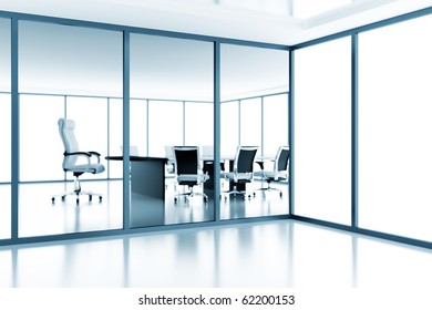 Empty Meeting Room Behind A Glass Partition In Modern Cubicle