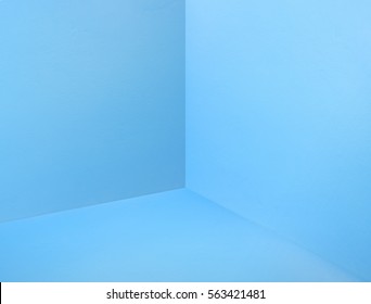 Empty Room Corner Painted In Pastel Blue Color Studio Room Background,Mock Up Template For Display Or Montage Of Design Or Text.