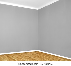 Empty Room Corner With Wooden Floor And Grey Wall 