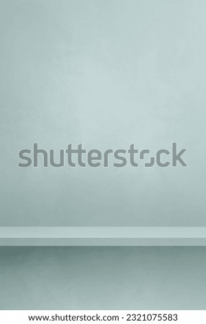 Empty shelf on a light blue concrete wall. Background template scene. Vertical mockup