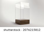 An empty square glass display case with a wooden base on an isolated white studio background - 3D render