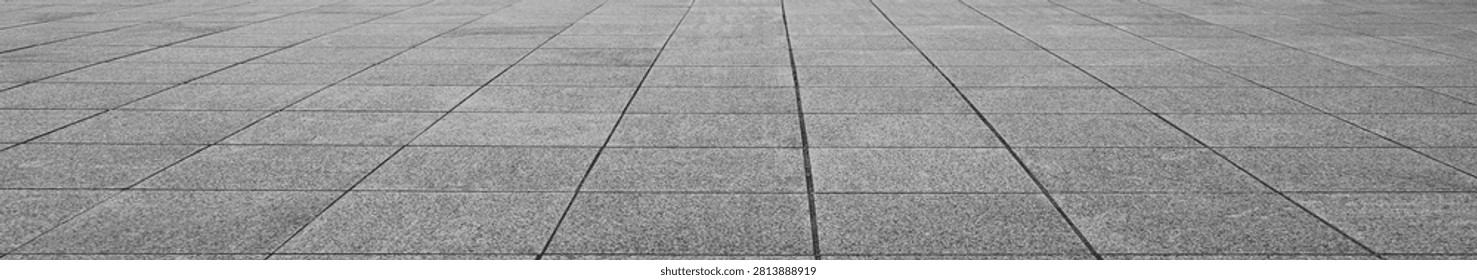 empty stone floor top in perspective. grey tile floor background in perspective view. line. empty copy space stone street. pavement. Granite outdoor tiled floor. gray granite. Marble texture