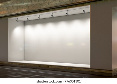 Empty Store Window At Night.  Illuminated Storefront Showcase. 3d Illustration 