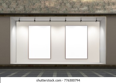 Empty store window at night. Two blank posters in illuminated storefront showcase. 3d illustration 