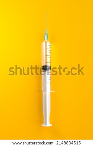 Similar – Medical syringe on colorful background.