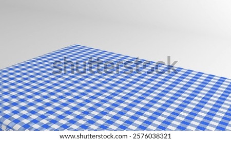 Empty table with blue checkered tablecloth and white background. Table with blue checkered cloth isolated on white.