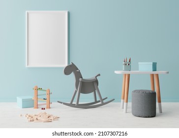 Empty Vertical Picture Frame On Blue Wall In Modern Child Room. Mock Up Interior In Scandinavian Style. Free, Copy Space For Your Picture. Rocking Horse, Table, Toys. Cozy Room For Kids. 3D Rendering.