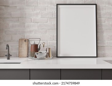 Empty Vertical Picture Frame Standing In Modern Kitchen. Mock Up Interior In Minimalist, Contemporary Style. Free, Copy Space For Your Picture, Poster. Close Up View. 3D Rendering