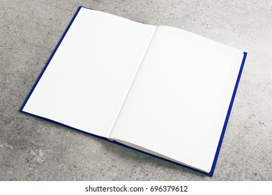 Empty white notepad on concrete surface. Advertisement, supplies, education, text, copy space concept. Mock up, 3D Rendering 