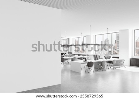 Empty white wall in a modern open office with workstations, large windows, and city view in bright daylight. Concept of office layout template. 3D Rendering.