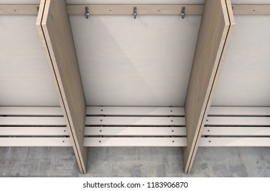 Empty Wooden Cubicles With A Bench And Hangers In A Rundown Sports Locker Change Room - 3D Render