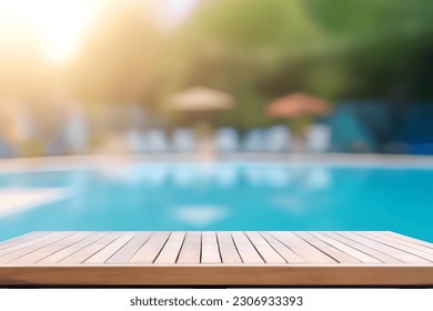 Empty wooden table top in front of swimming pool at summer blurred background. Template for product presentation display